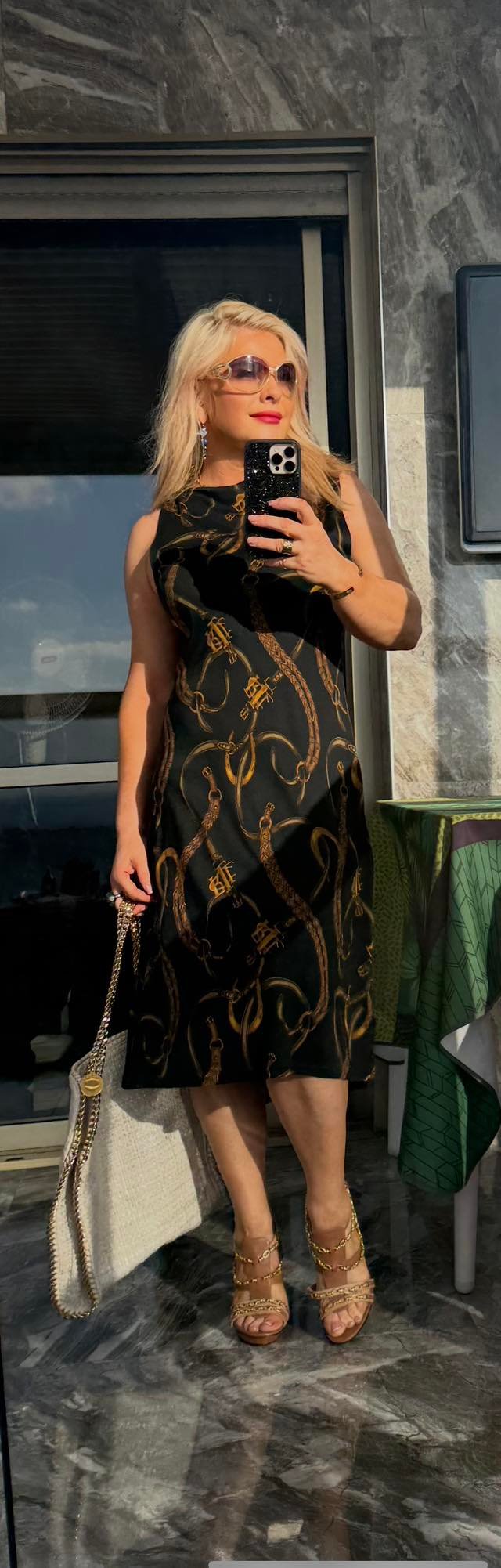 «Чёрное платье Ralph Lauren с цепочным принтом, размер M — 450 ₪».